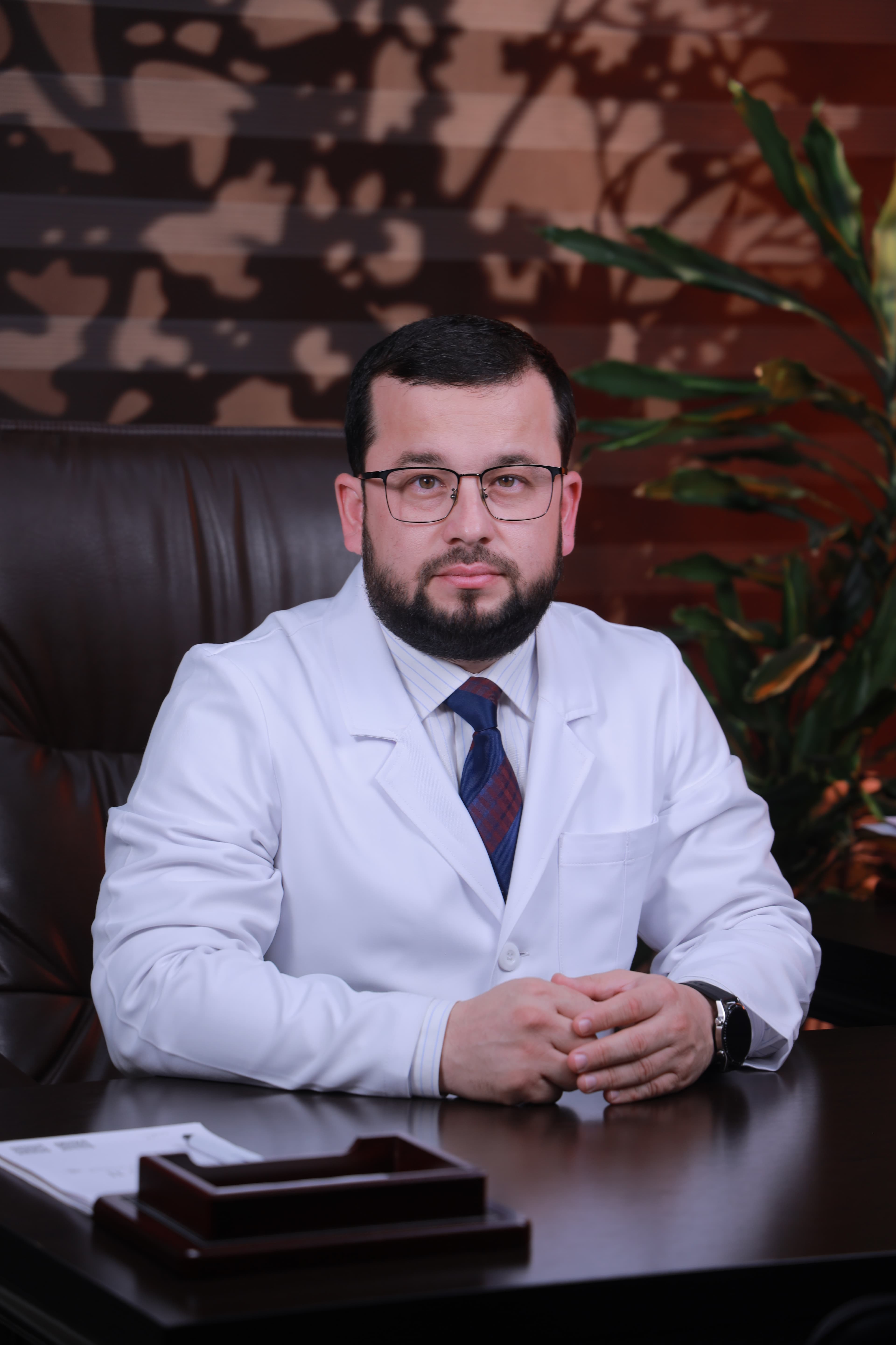 Dr. Alisher Kurbanov